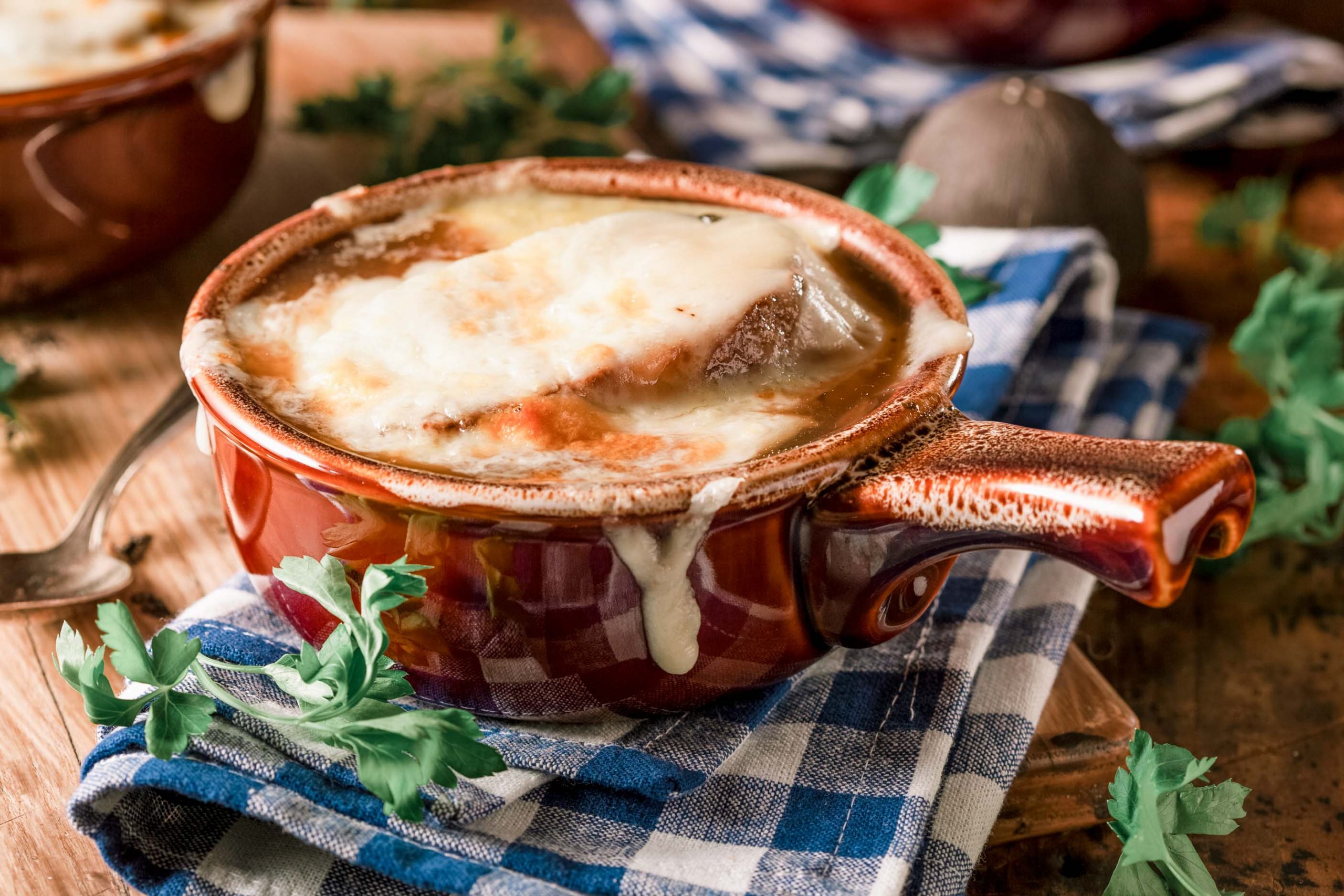 French onion soup with cheese melted on top