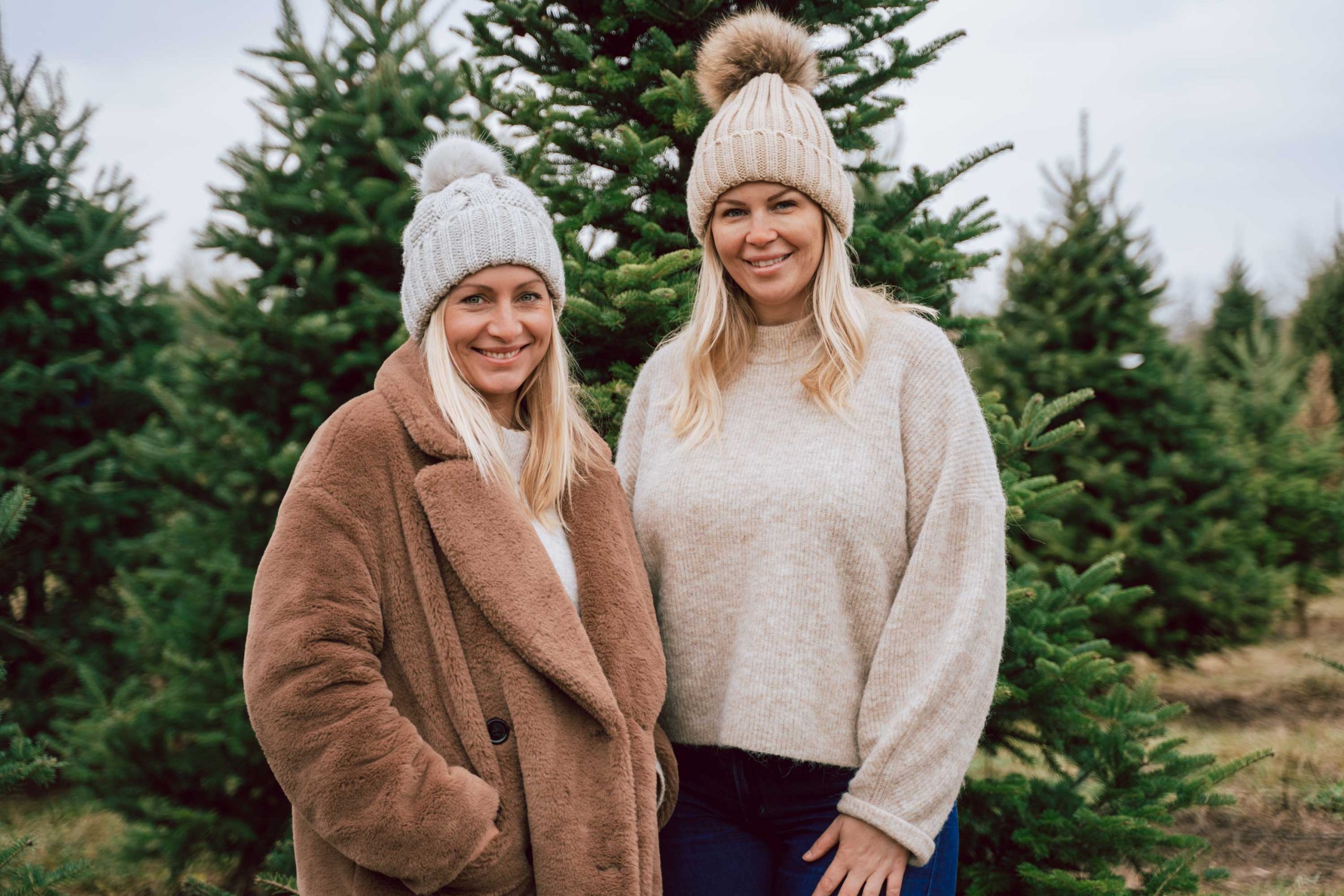Image of Ashley & Lisa from the Rise Realty Group at Merry Christmas Tree Farm